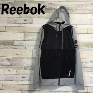 リーボック(Reebok)の購入者ありリーボック 肩ロゴ フルジップパーカー グレーｘブラック サイズM(パーカー)