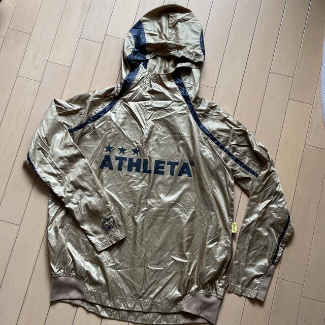 ATHLETA(アスレタ)のATHLETA アスレタ  長袖ウエア・ゴールド スポーツ/アウトドアのサッカー/フットサル(ウェア)の商品写真