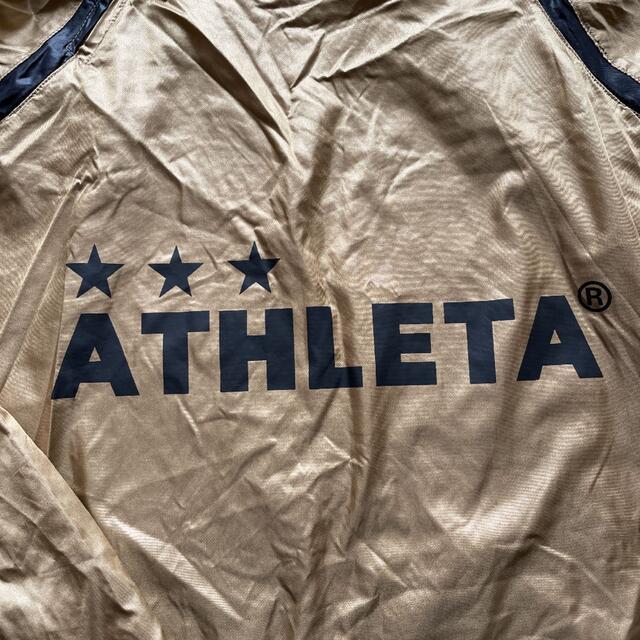 ATHLETA(アスレタ)のATHLETA アスレタ  長袖ウエア・ゴールド スポーツ/アウトドアのサッカー/フットサル(ウェア)の商品写真