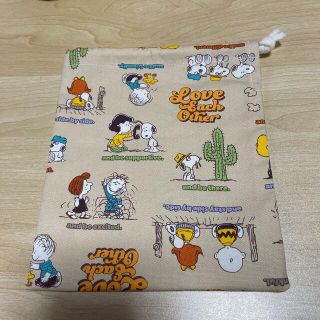 ピーナッツ(PEANUTS)の巾着袋＊小＊スヌーピー(ベージュ)(外出用品)