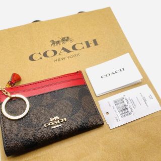 コーチ(COACH)のミニ スキニー ID ケースシグネチャー キャンバス ブラウン 1941 レッド(パスケース/IDカードホルダー)