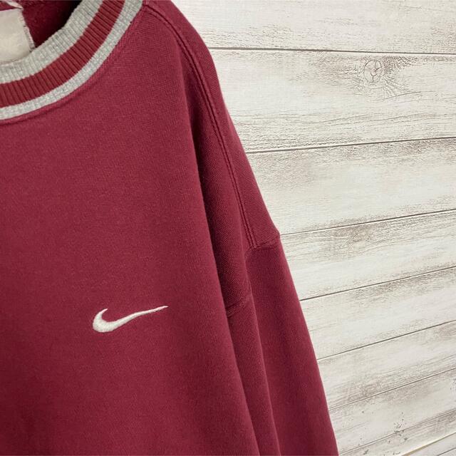 NIKE(ナイキ)の【希少デザイン】90sナイキ銀タグ刺繍ワンポイントロゴリブラインスウェット メンズのトップス(スウェット)の商品写真