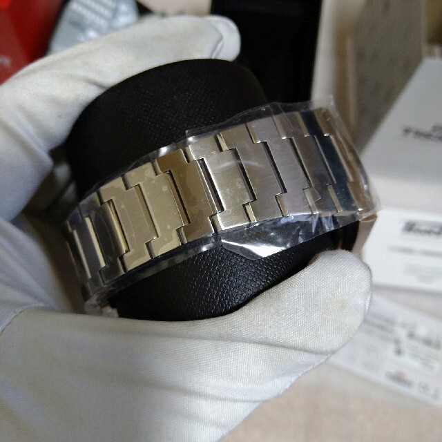 TISSOT(ティソ)のTissot　PRX 自動巻き　ブルー文字盤　国内正規店購入品　保護シール付新品 メンズの時計(腕時計(アナログ))の商品写真