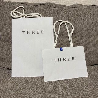 スリー(THREE)のTHREE ショップ袋 紙袋(ショップ袋)