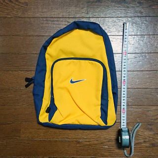 ナイキ(NIKE)の【新品】NIKE リュック 子供用 イエロー×ネイビー(リュックサック)