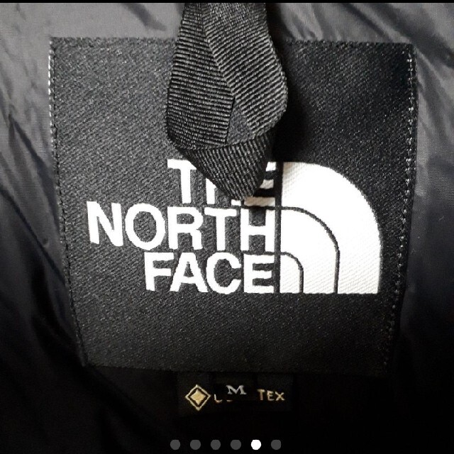 THE NORTH FACE(ザノースフェイス)のノースフェイス　マウンテンダウン　ブリティッシュカーキ メンズのジャケット/アウター(ダウンジャケット)の商品写真