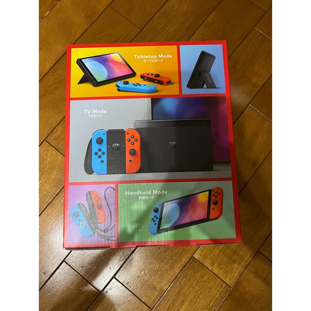 Nintendo Switch(ニンテンドースイッチ)のNintendo Switch (有機ELモデル) ネオン　本体 新品 エンタメ/ホビーのゲームソフト/ゲーム機本体(家庭用ゲーム機本体)の商品写真