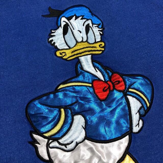 Disney 90sの通販 by ★フォロー割★古着屋ぽっぽ|ディズニーならラクマ - ディズニー☆ドナルドダックビッグキャラ刺繍ロゴバイカラー切替スウェット 特価新品