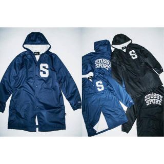 ステューシー(STUSSY)の未使用 stussy  champion ロングジャケット ネイビー(ナイロンジャケット)