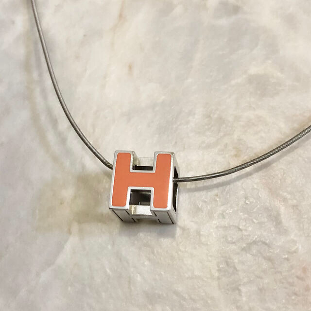エルメス ネックレス カージュドアッシュ H ロゴ キューブ オレンジ 銀
