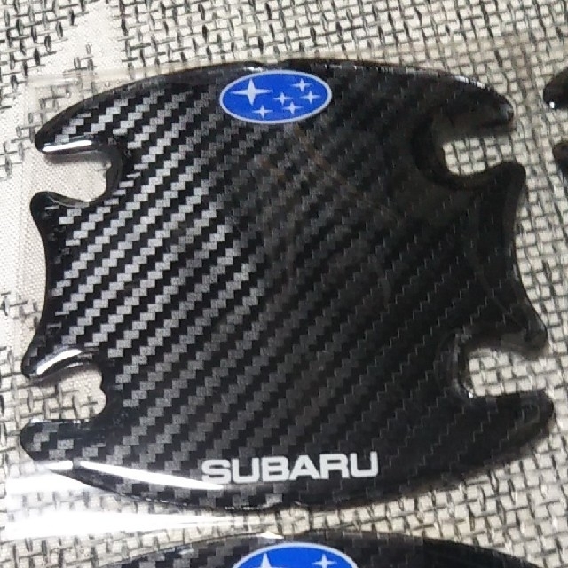 スバル(スバル)のSUBARU 極厚5Dカーボンドアハンドルボウルプロテクターステッカー8p 自動車/バイクの自動車(車外アクセサリ)の商品写真