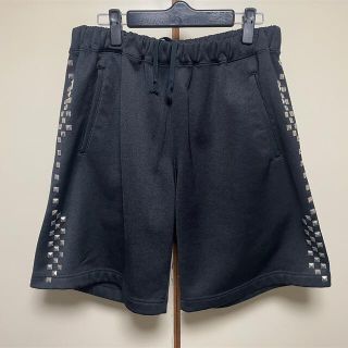 コムデギャルソンオムプリュス(COMME des GARCONS HOMME PLUS)のコムデギャルソンオムプリュス スタッズジャージハーフパンツ ショート 黒(ショートパンツ)