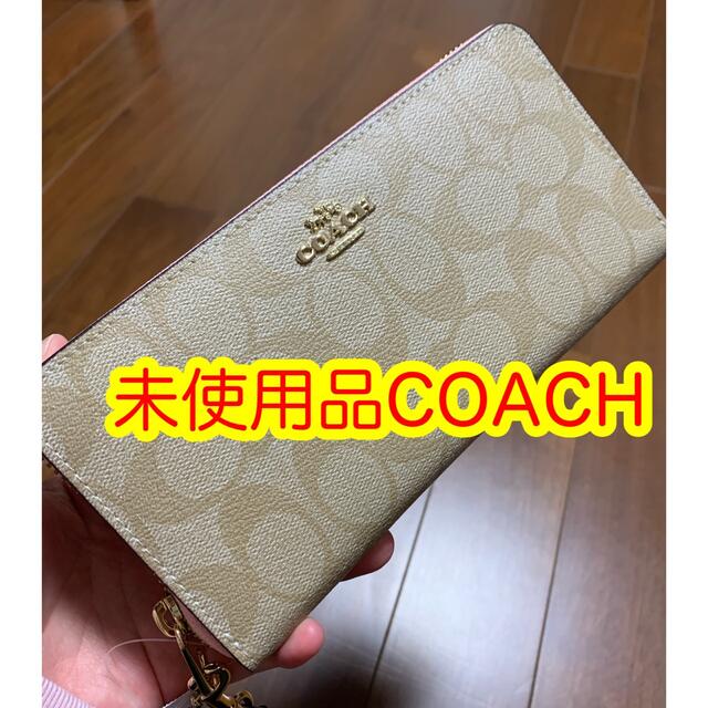 COACH(コーチ)のコーチ　財布　長財布　アイボリーシグネチャー　ストラップ付き レディースのファッション小物(財布)の商品写真