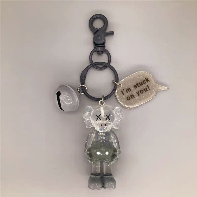 【新品・未使用】 カウズ　kaws キーホルダー　バッグホルダー　鈴付き　白透明 エンタメ/ホビーのアニメグッズ(キーホルダー)の商品写真