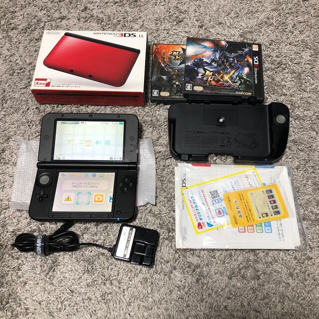 ニンテンドー3DS(ニンテンドー3DS)のNintendo 3DS  LL 本体 レッド/ブラック エンタメ/ホビーのゲームソフト/ゲーム機本体(携帯用ゲーム機本体)の商品写真