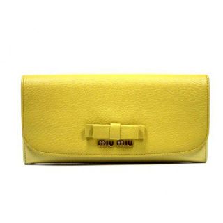 ミュウミュウ(miumiu)の【値下げ】未使用　ミュウミュウ　長財布　リボン付　5M1109　イエロー(財布)