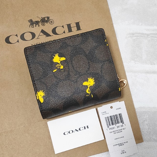 54%OFF!】 COACH×PEANUTS スナップウォレット ウッドストック柄