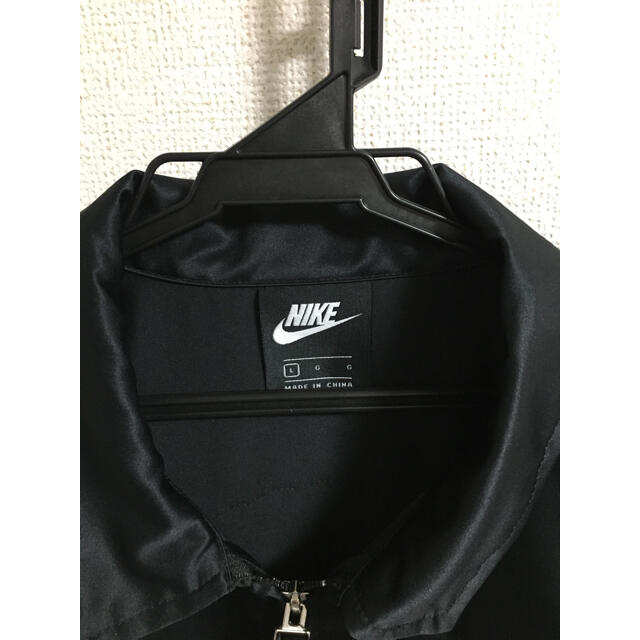 NIKE(ナイキ)の【新品タグ付】ナイキ ロングコート/アイコンクラッシュ ロング SA ジャケット レディースのジャケット/アウター(ロングコート)の商品写真