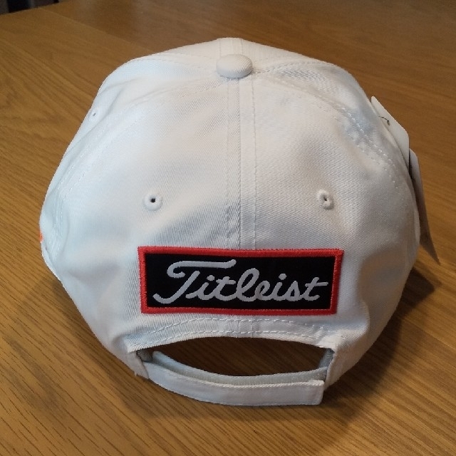 Titleist(タイトリスト)の新品未使用品 タイトリスト ゴルフキャップ[ホワイト/オレンジ] スポーツ/アウトドアのゴルフ(その他)の商品写真