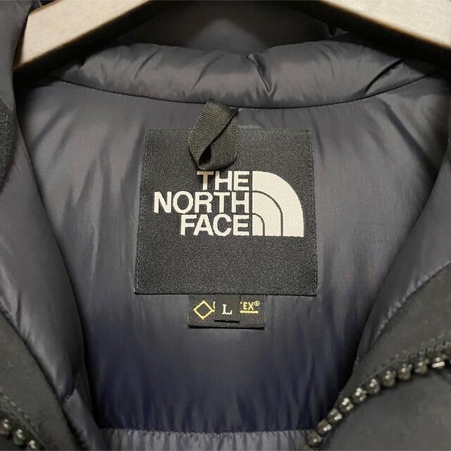 THE NORTH FACE(ザノースフェイス)の【新品未使用品】マウンテンダウンジャケット　黒　L メンズのジャケット/アウター(ダウンジャケット)の商品写真