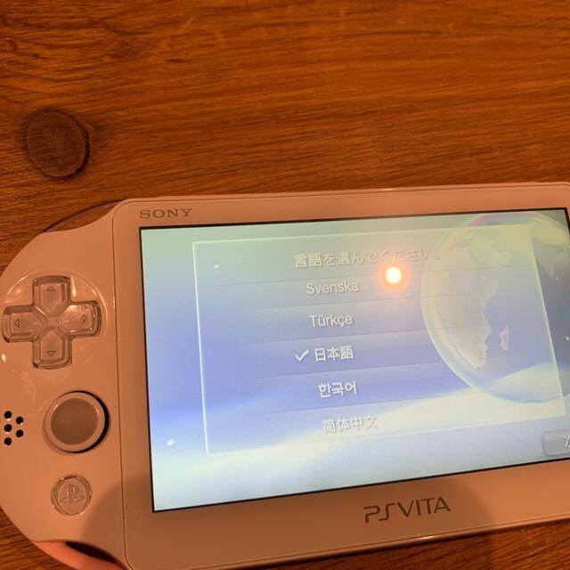 PlayStation Vita(プレイステーションヴィータ)の【yuffaさま専用】psvita 本体 ライトピンク/ホワイト32GB付 エンタメ/ホビーのゲームソフト/ゲーム機本体(携帯用ゲーム機本体)の商品写真