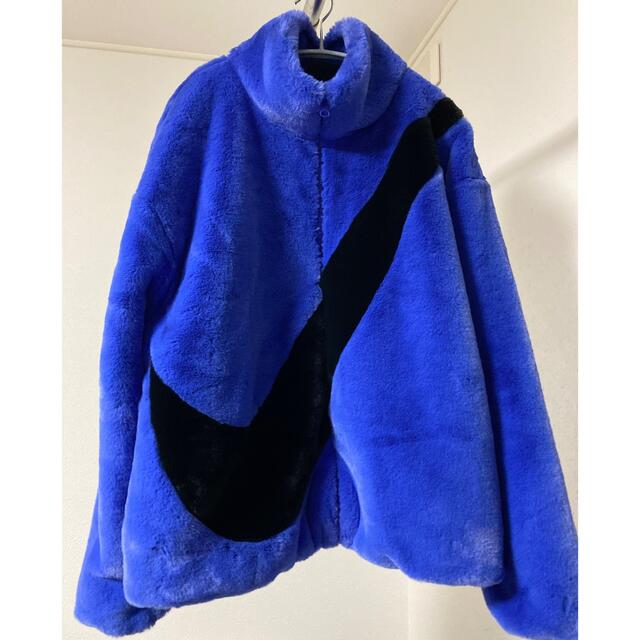 NIKE(ナイキ)のNIKE フェイクファー ジャケット ビッグスウッシュ ブルー 2XL レディースのジャケット/アウター(毛皮/ファーコート)の商品写真