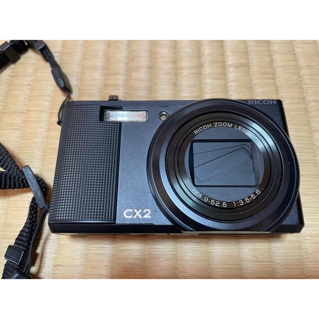 RICOH(リコー)のRICOH デジタルカメラ CX2 BLACK 箱説明書保護シール純正ケース付 スマホ/家電/カメラのカメラ(コンパクトデジタルカメラ)の商品写真