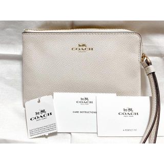 コーチ(COACH)の【未使用】COACHポーチ　白　美品(ポーチ)