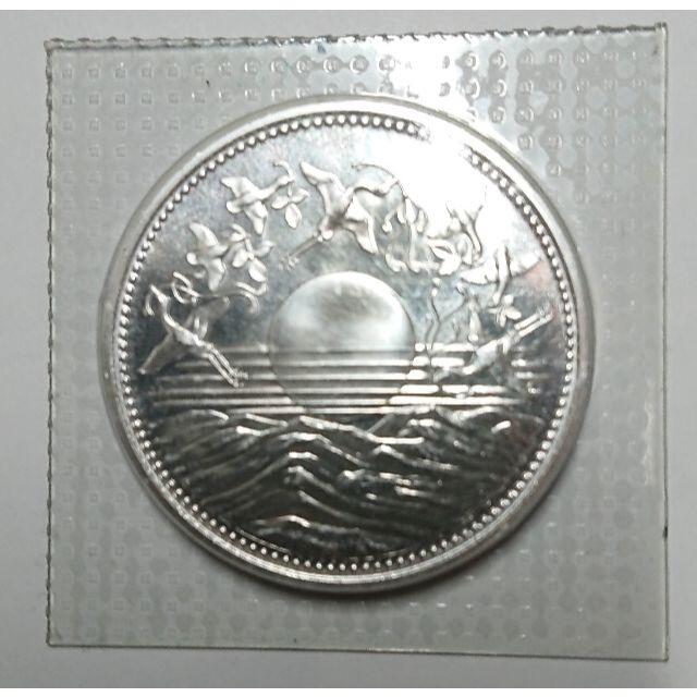 1万円硬貨　昭和61年　御在位60年記念 エンタメ/ホビーのコレクション(その他)の商品写真