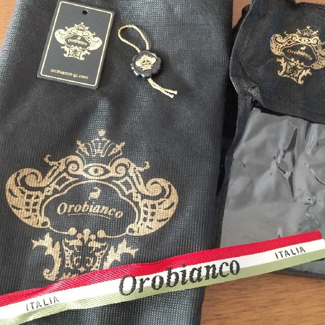 Orobianco(オロビアンコ)のオロビアンコ リボン&保存袋一式 メンズのバッグ(その他)の商品写真