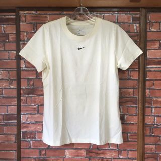 ナイキ(NIKE)の新品 NIKE ナイキ 半袖Tシャツ L レディースTシャツ パステルイエロー(Tシャツ(半袖/袖なし))