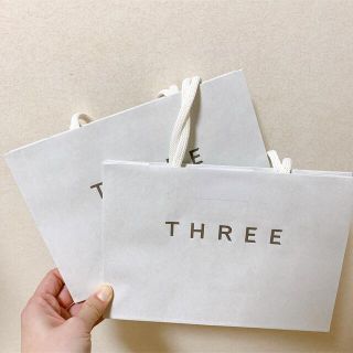 スリー(THREE)のTHREE 紙袋(ショップ袋)