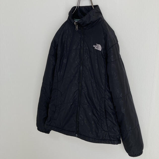 THE NORTH FACE(ザノースフェイス)のノースフェイス キルティングジャケット 花柄 ブラック レディースM レディースのジャケット/アウター(ブルゾン)の商品写真