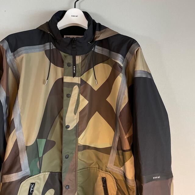 sacai(サカイ)の即完売‼︎ sacai KAWS コラボ マウンテンパーカー ナイロンパーカー メンズのジャケット/アウター(マウンテンパーカー)の商品写真