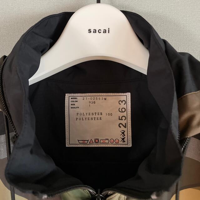 sacai(サカイ)の即完売‼︎ sacai KAWS コラボ マウンテンパーカー ナイロンパーカー メンズのジャケット/アウター(マウンテンパーカー)の商品写真