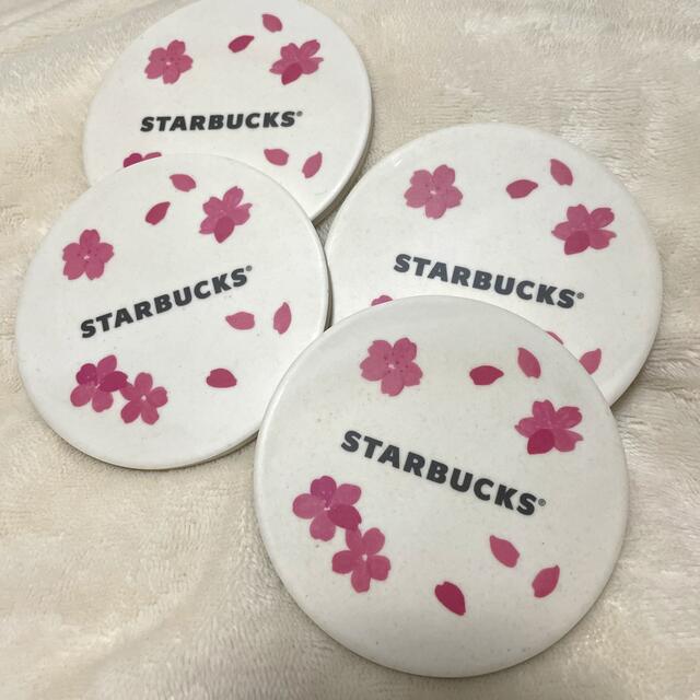 Starbucks Coffee(スターバックスコーヒー)のスターバックス☆新品未使用！桜コースター４枚セット インテリア/住まい/日用品のキッチン/食器(テーブル用品)の商品写真