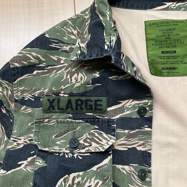 XLARGE(エクストララージ)の値引きエクストララージ　タイガーカモシャツジャケットL メンズのジャケット/アウター(ミリタリージャケット)の商品写真