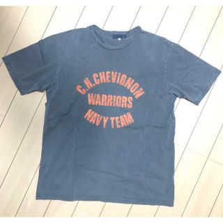 シェビニオン(CHEVIGNON)のオレンジ英字グレーtシャツ(Tシャツ/カットソー(半袖/袖なし))