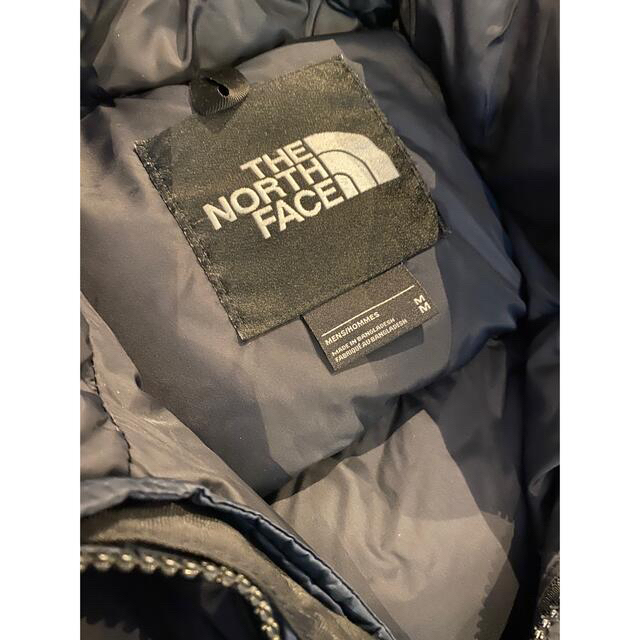 THE NORTH FACE(ザノースフェイス)のクリーニング済THE NORTH FACE ヌプシネイビーxブラックM メンズのジャケット/アウター(ダウンジャケット)の商品写真