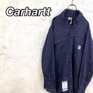 カーハート(carhartt)の希少 90s カーハート ワークシャツ タグロゴ ビッグシルエット 紺 美品.(シャツ)