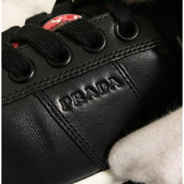 PRADA(プラダ)の【美品 18AW】【4E2845】PRADA「リネアロッサ」レザースニーカー メンズの靴/シューズ(スニーカー)の商品写真