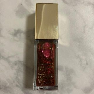 クラランス(CLARINS)のCLARINS クラランス コンフォート リップオイル 09(リップグロス)