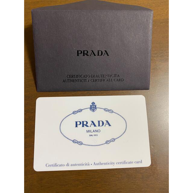 PRADA(プラダ)の【1/24まで限定大幅値下げ】プラダ PRADA 三角プレート ダウンジャケット レディースのジャケット/アウター(ダウンジャケット)の商品写真