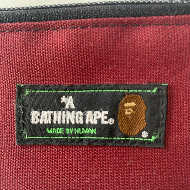 A BATHING APE(アベイシングエイプ)のA BATHING APE 小銭入れとマスク（非売品） メンズのファッション小物(コインケース/小銭入れ)の商品写真