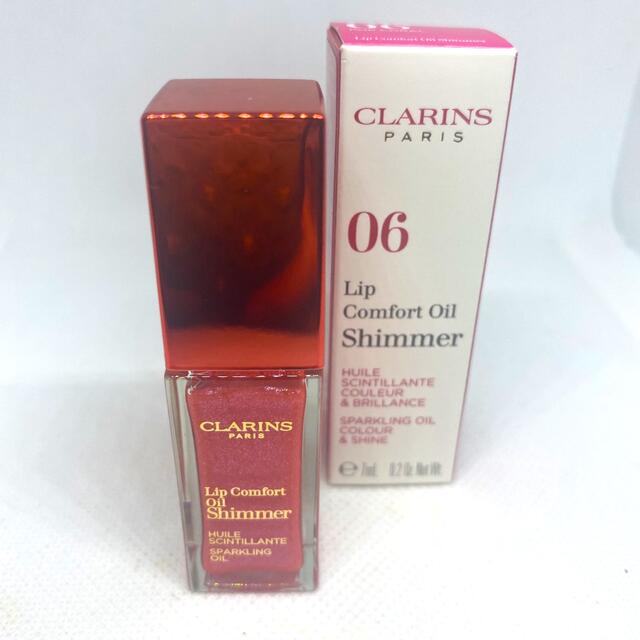 CLARINS(クラランス)のクラランス コンフォート リップオイル シマー 06 ポップコーラル 新品未使用 コスメ/美容のベースメイク/化粧品(リップグロス)の商品写真