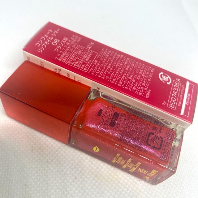 CLARINS(クラランス)のクラランス コンフォート リップオイル シマー 06 ポップコーラル 新品未使用 コスメ/美容のベースメイク/化粧品(リップグロス)の商品写真