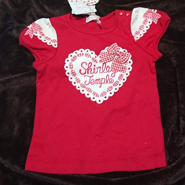 Shirley Temple(シャーリーテンプル)のシャーリーテンプル 赤リボンハートTシャツ B品 キッズ/ベビー/マタニティのキッズ服女の子用(90cm~)(Tシャツ/カットソー)の商品写真