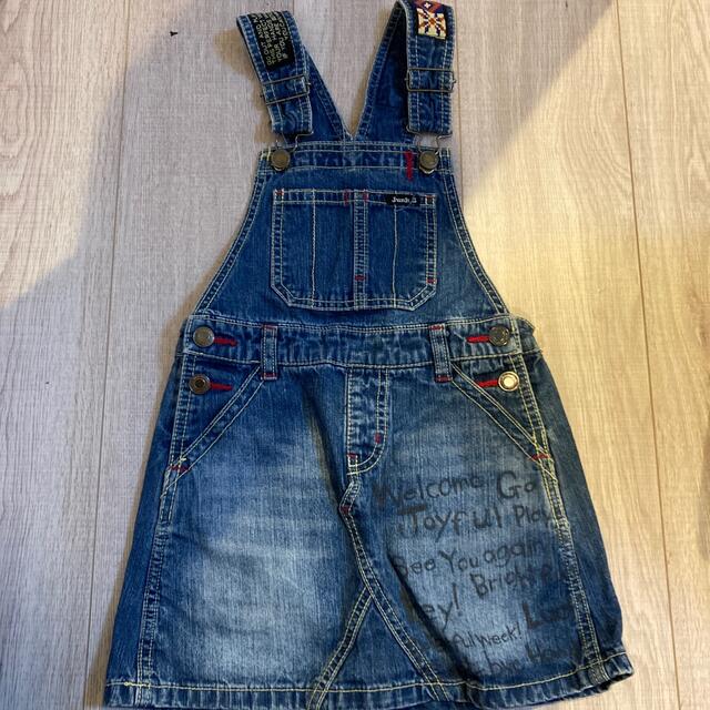 JUNK STORE(ジャンクストアー)のデニム　ジャンバースカート　ミニオン　130 キッズ/ベビー/マタニティのキッズ服女の子用(90cm~)(スカート)の商品写真