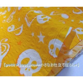 No.1097-O　音符＆ドクロ模様のリップル　110×50　オレンジ(生地/糸)