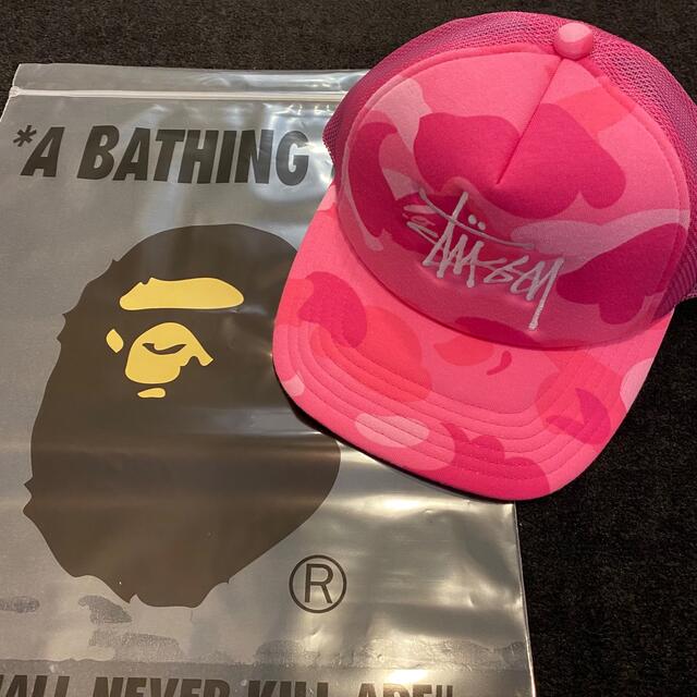 A BATHING APE(アベイシングエイプ)の新品 STUSSY & BAPE TRUCKER CAP ピンク メンズの帽子(キャップ)の商品写真